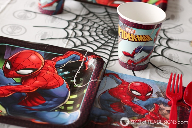 5+ budget friendly spider-man party hacks - diy table runner accent made with cricut cutting machine | spotofteadesigns.com