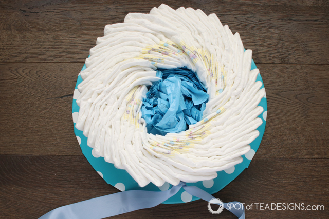 How to make a diaper cake for a baby shower without rollling diapers and using rubber bands | spotofteadesigns.com