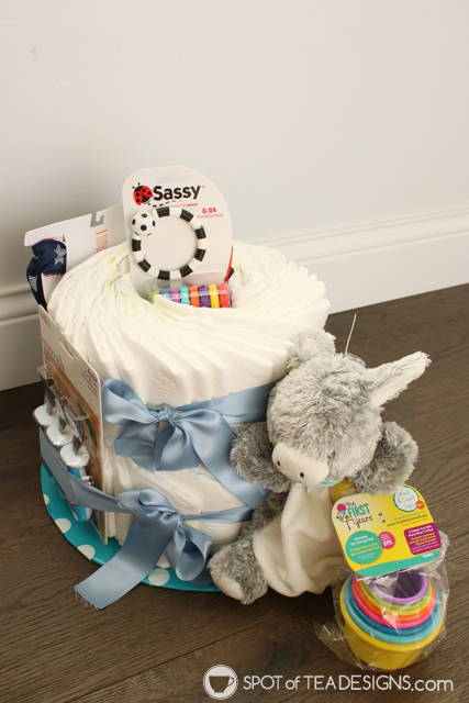 How to make a diaper cake for a baby shower without rollling diapers and using rubber bands | spotofteadesigns.com