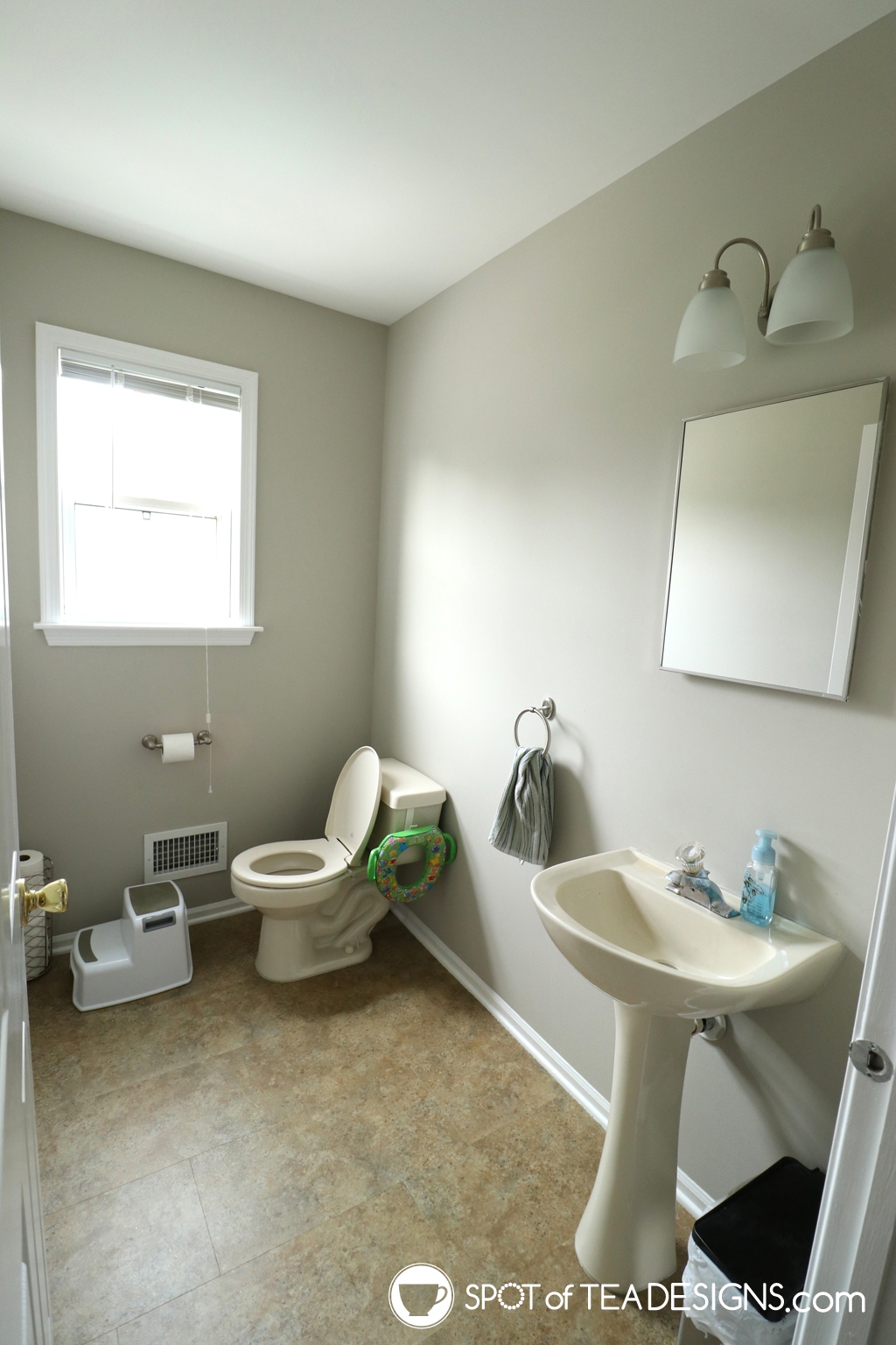 Modern Half Bathroom Remodel | Before Photos - Spot of Tea Designs
