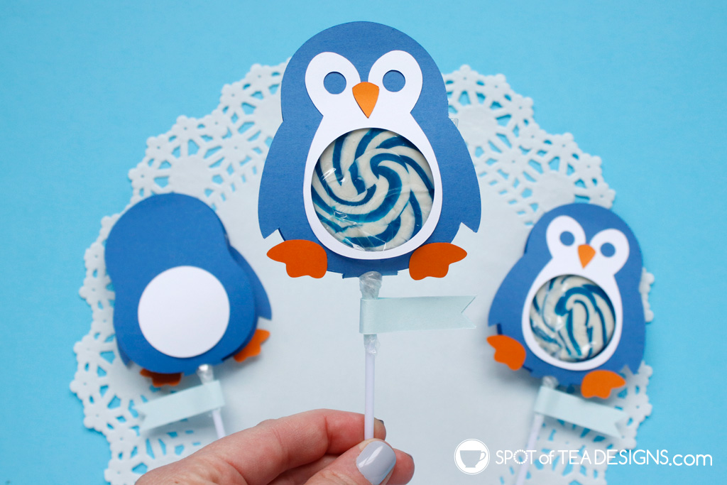 https://spotofteadesigns.com/wp-content/uploads/2021/12/Penguin-Lollipop-SVG-Final-horizontal-2.jpg